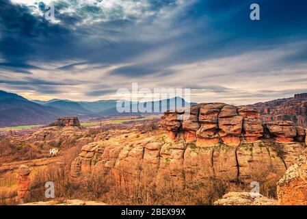 Wide angle view of incredible rock formations in the historical town of Belogradchik, Northwest Bulgaria, Balkan Mountains Stock Photo