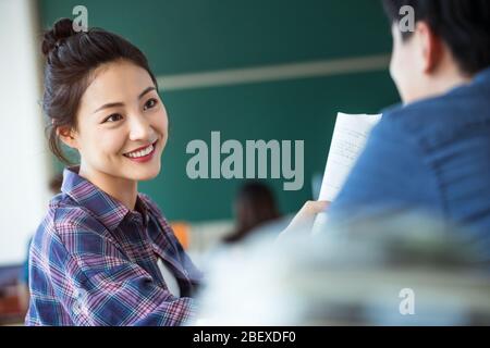 Back in the classroom discussion learning of college students Stock Photo