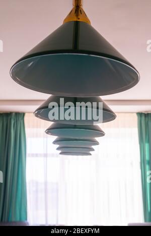 Close up of lamps hang over billiard table. Stock Photo