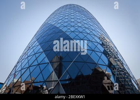 Low-angle shot of The Gherkin Tower, London. England, U.K. Stock Photo