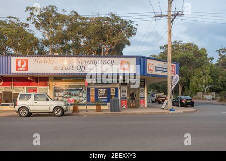 The local newsagency and post office early on a Sunday morning in the mid north coast town of Hawks Nest, New South Wales, Australia Stock Photo