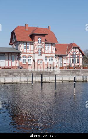 26 March 2020, Mecklenburg-Western Pomerania, Loitz: The former station building is located at the port of Loitz in the district of Vorpommern-Greifswald. After the building was not used for many years, former inhabitants of Loitz decided to give the old station a new shine. Over several years they lovingly restored the entire building and thus saved it from decay. Today the house 'Korl Loitz' houses the restaurant of the same name. Loitz is a town that has lost almost half of its inhabitants since reunification. After the end of the war, several thousand German refugees also found a new home Stock Photo