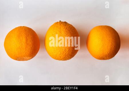 A group of oranges on a table Stock Photo