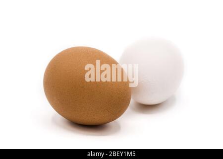 Brown and white eggs isolated on white background Stock Photo