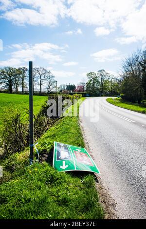 Knocked over and abandoned road sign UK Stock Photo - Alamy