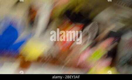 Multicolored blurred, defocused background of stationery or other objects. Abstract motion blur. Close-up. Stock Photo