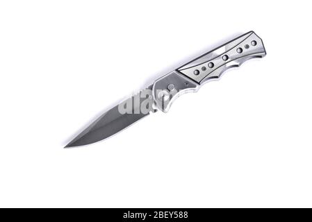 silver folding knife on a white background close-up Stock Photo