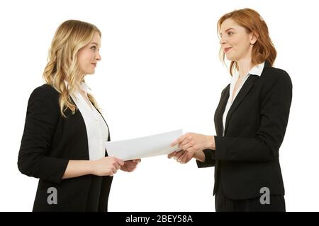 Agreement between two beautiful businesswomen. Paper, contract. Stock Photo