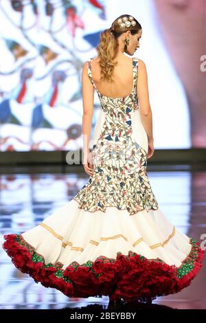 SEVILLA, SPAIN - JAN 30: Model wearing a dress from the Brida collection by designer Maria Amador as part of the SIMOF 2020 (Photo credit: Mickael Chavet)