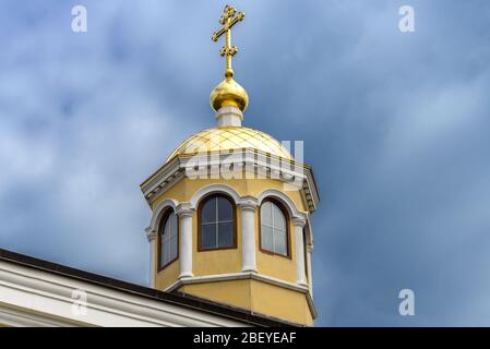 Crosses on the Church domes photographed against the cloudy sky Stock Photo