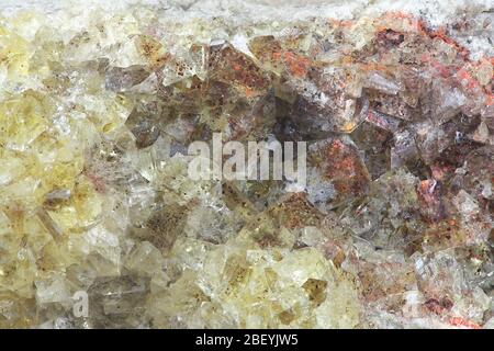 Crystals of fluorite with hematite inclusions from Illo calcite quarry in Finland Stock Photo