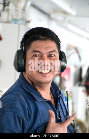 smiling filippino cew from a cruise liner,Filipino crew,ships crew,merchant navy,passenger ship crew,cruise ship job,pradeep subramanian Stock Photo