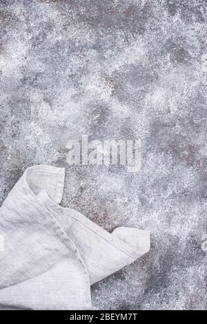 Linen napkin or towel on grey kitchen table Stock Photo