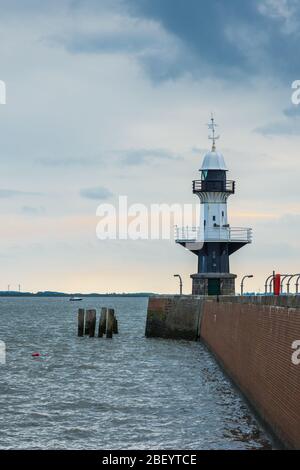 Historic lighthouse at the Brunsbuettel lock, entrance to the Kiel Canal, Schleswig-Holstein, North Sea, Germany Stock Photo