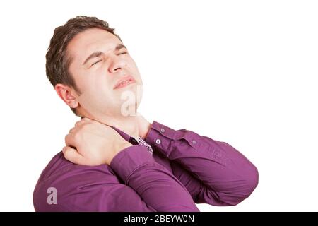 Young man has pain in his shoulder Stock Photo
