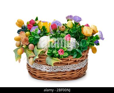 Easter basket from a flower arrangement  on white background Stock Photo