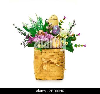 Easter basket from a flower arrangement on white background Stock Photo