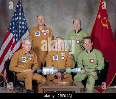 These five men composed the two prime crews of the joint United States-USSR Apollo-Soyuz Test Project (ASTP) docking mission in Earth orbit .  Thomas P. Stafford (standing left), cosmonaut Aleksey A. Leonov (standing righ Stock Photo