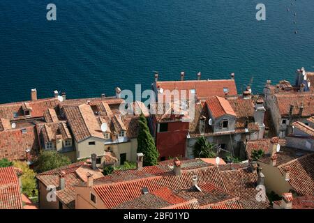 The facades of the houses on the beach are directly facing the sea Stock Photo