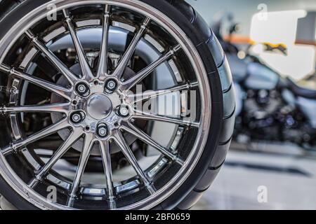 Rims from a sports car. The concept of tuning the wheels of a car. Car wheel. Close up photo. Stock Photo