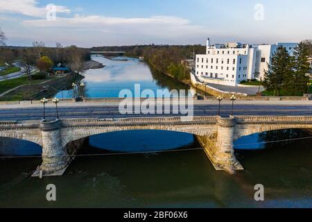 Indianapolis, Indiana / United States - April 4th, 2020: Sitting on the edge of the White River, the former Heslar Naval Armory, opened in 1938, was c Stock Photo