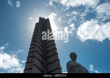 Urban wildlife: Looking up the José Martí Memorial tower with turkey vultures (Cathartes aura) circling the op of the monument, Havana, Cuba Stock Photo