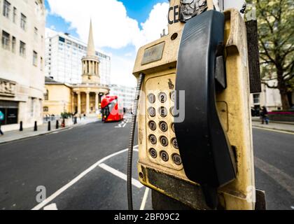 London- and old taxi phone outside BBC's Broadcasting house on Regent Street Stock Photo