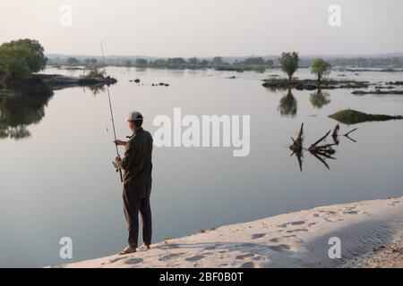 Zambezi National Park, Matabeleland North Province, Zimbabwe offers camping on the banks of the mighty Zambezi River. Stock Photo