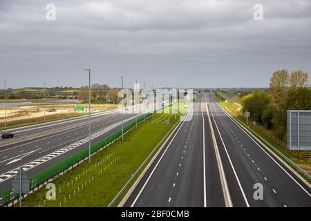 PIC BY GEOFF ROBINSON PHOTOGRAPHY 07976 880732.   Picture dated April 13 shows main A1 road at Huntingdon in Cambridgeshire on Bank Holiday Monday lunchtime as most people stay at home and leave the roads empty.   The roads across Britain were empty today on Easter Bank Holiday Monday (Mon) as lockdown continues to help stop the spread of coronavirus. There were 12 million leisure car journeys made over the Easter Bank Holiday weekend last year, but today the main A1 road at Huntingdon in Cambridgeshire was deserted.  The Easter holidays are traditionally a time to get-away but this year the g Stock Photo