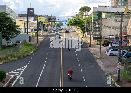 Campo Grande - MS, Brazil - March 30, 2020: View of the traffic at Avenida Ceara avenue. Avenue with commerce around. Stock Photo