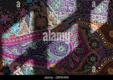 Detail close up of colourful embroidered Indian textile made in  Rajasthan, India Stock Photo