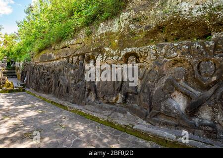 Horizontal view of the Yeh Pulu Relief in Bali, Indonesia. Stock Photo