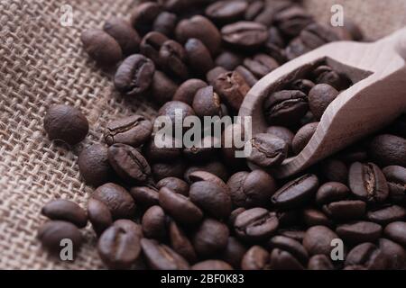 Close up of raw coffee beans on table. Stock Photo