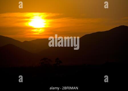 sunset over mountain range in little karoo, south africa Stock Photo