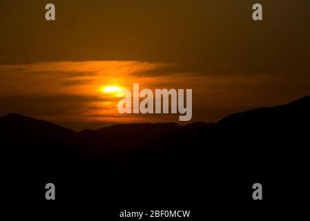 sunset over mountain range in little karoo, south africa Stock Photo