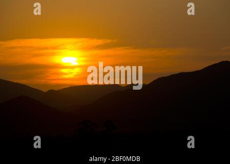 sunset over mountain range in little karoo, south africa Stock Photo