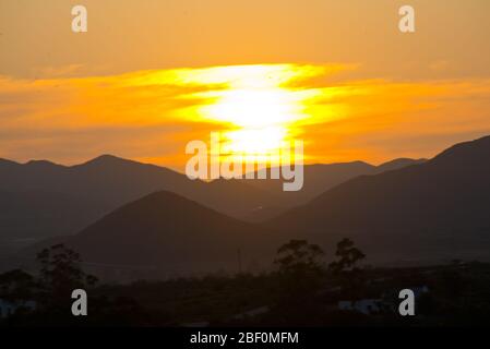 sunset over mountain range in little karoo, south africa Stock Photo