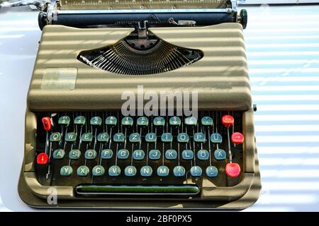 Keyboard of a retro typewriter, illuminated by sunlight Stock Photo