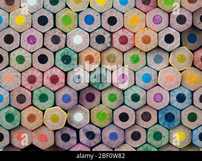background of unsharpened bottoms of multi colored pencils. closeup Stock Photo