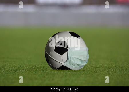 Download Football Sports Ball Wearing A Medical Protective Mask 3d Render Stock Photo Alamy PSD Mockup Templates