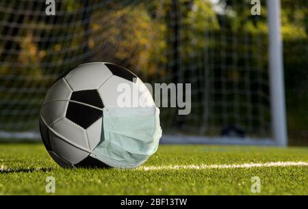 Download Football Sports Ball Wearing A Medical Protective Mask 3d Render Stock Photo Alamy PSD Mockup Templates