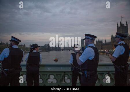 Westminster, London, UK. 16th Apr 2020. Emergency services take part in the Clap for Carers on Westminster Bridge in view of St Thomas' Hospital dedicated to NHS workers, due to the outbreak of coronavirus. Credit: Marcin Nowak/Alamy Live News Stock Photo