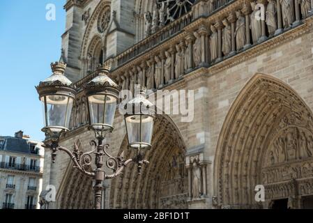 Antique Street Light in front of the Notre Dame Cathedral in Paris/Europe Stock Photo