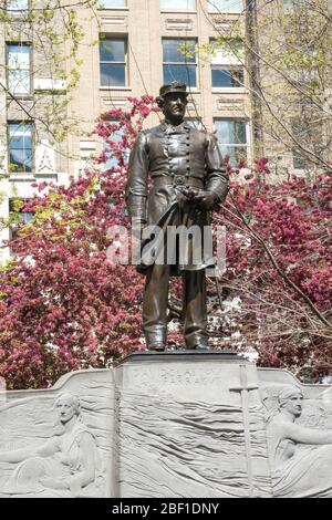 Farragut Monument is surrounded by beautiful spring trees in Madison Square Park, NYC, USA  2020 Stock Photo