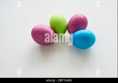 Painted multicolored eggs against a light background. Diet, protein, protein.Preparing for Easter. Stock Photo