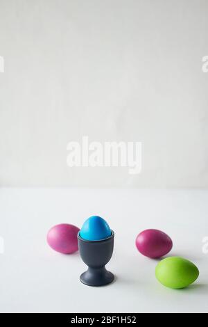 Painted multicolored eggs against a light background.Diet, protein, protein. Preparing for Easter. Stock Photo