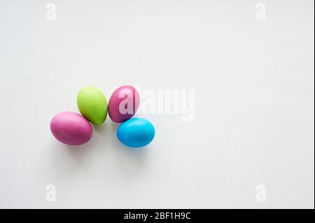 Painted multicolored eggs against a light background. Diet, protein, protein.Preparing for Easter. Stock Photo
