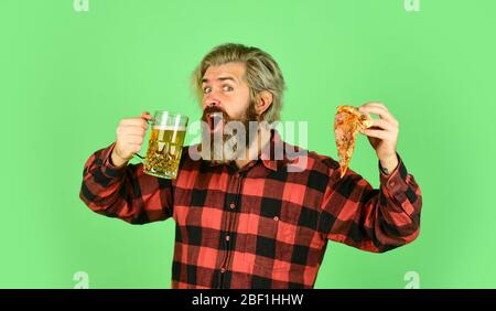 Best party here. bachelor men club. Having fun and drink in bar. nice pub menu. man watching football while drinking beer and eating pizza. eating pizza and drinking. take-away pizza. Stock Photo