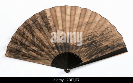 Pleated fan. Pleated fan with linen and sateen leaf with paper filler. Obverse: charcoal drawing of landscape; reverse: blank. Black painted wood sticks. Stock Photo