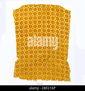 Textile. Flower shapes in relief against a pressed background. The illusion of two colors is given because part of the pile has been flattened. In strong yellow. Stock Photo